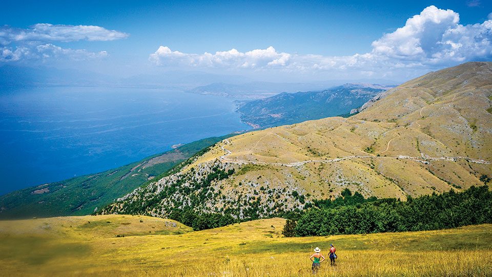 Winding mountain road climbing into Galicica National Park